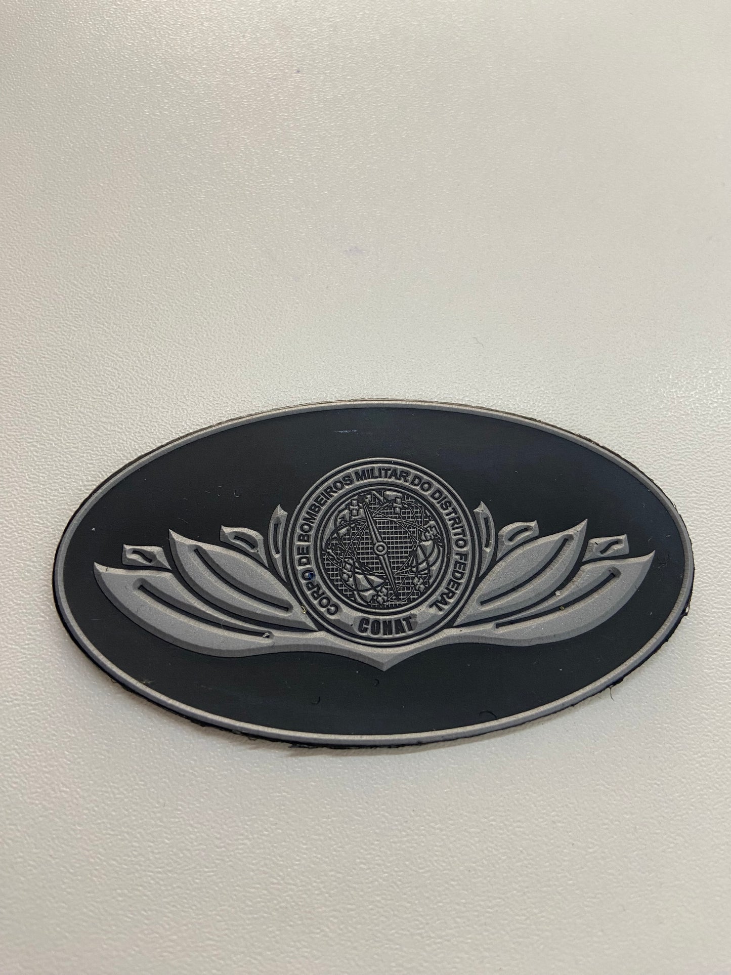 Distintivo emborrachado elipse CONAT